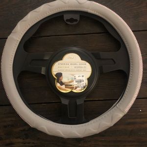 New steering wheel cover. Gray with pink diamonds.